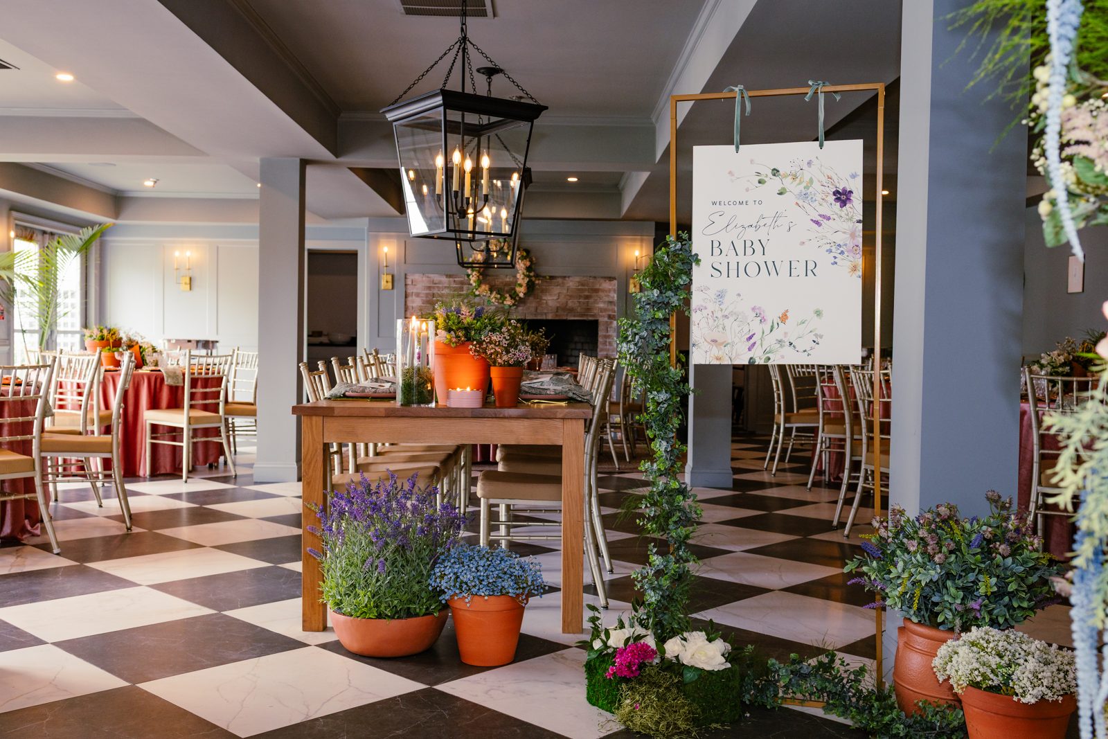 Styled baby shower in an elegant checkered-floor venue